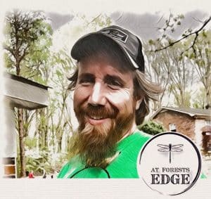 My husbands hair sticking out of his hat