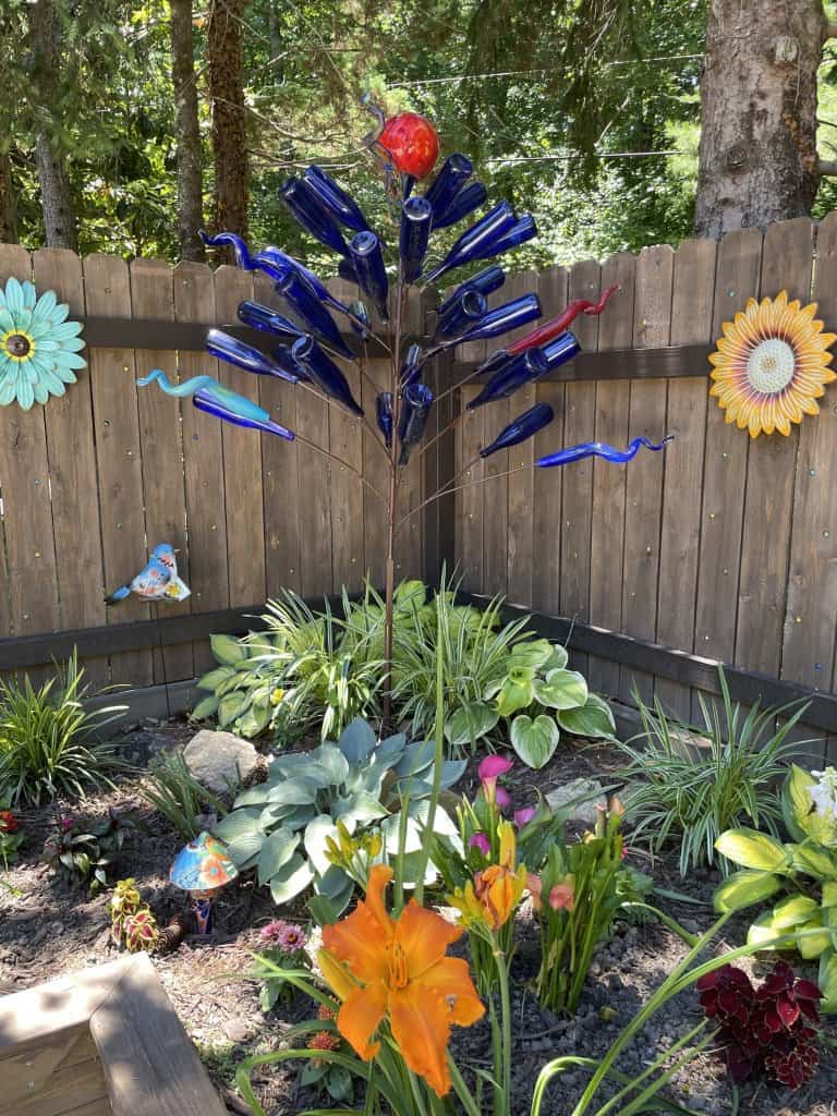 My father-in-law's whimsical garden. Gardening goals!