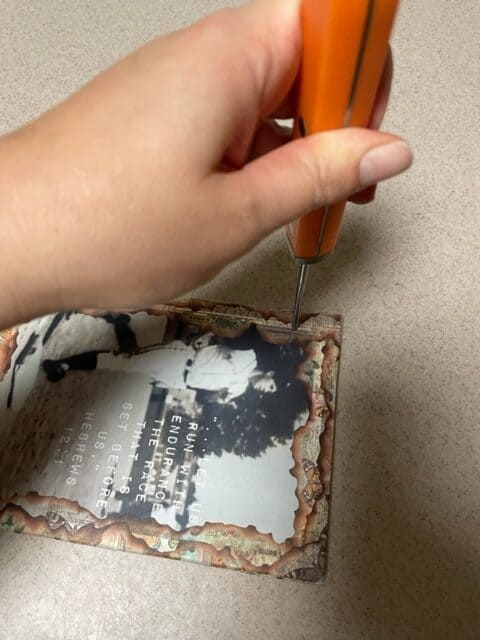 Puncturing the covers through to the bottom with an awl.