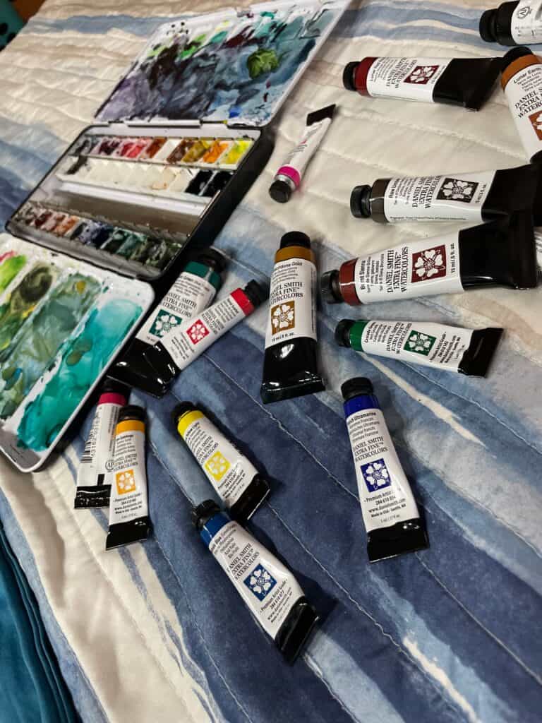 Watercolor paints in a tube and pallet.