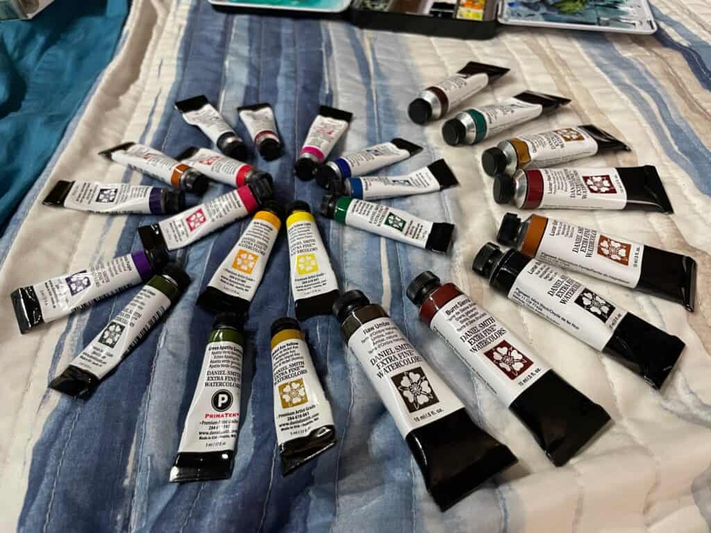 My artist-grade watercolor paint from Daniel Smith. Arranged in a pythegorean theorem shell.