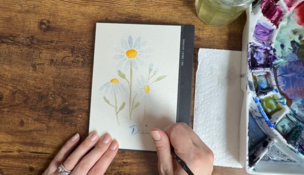 Writing daisy on the the watercolor daisy tutorial to finish it up!