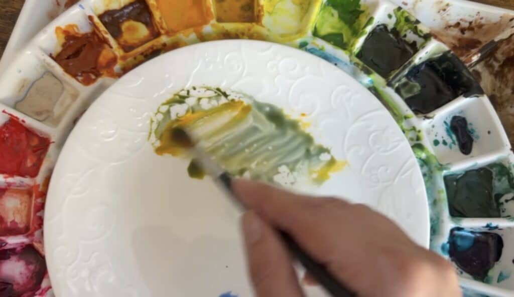 mixing yellow and blue to make green